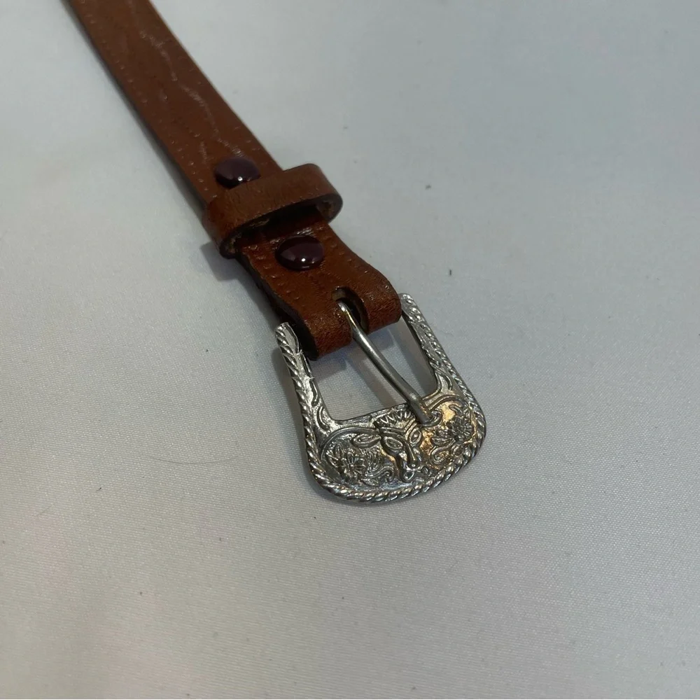 Child’s brown tribal beaded belt. Braided edge. Size 28. Pre-owned. Eagle. Arrow
